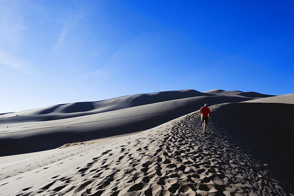 Hiker at Great Sand Dunes National Park, Colorado, United States of America, North America