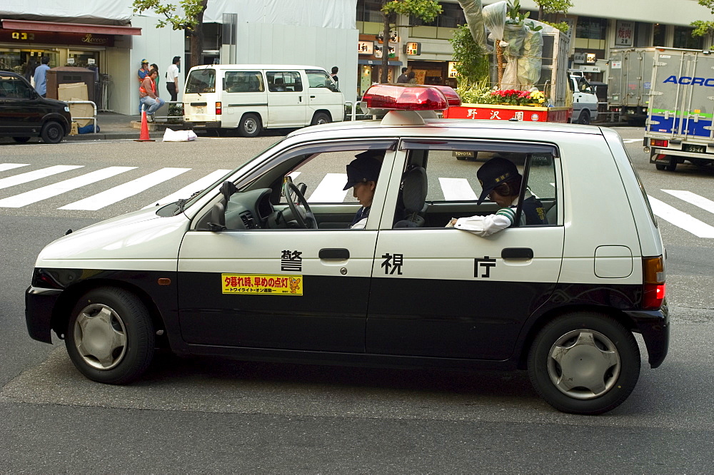 Small mini police car, Tokyo, Honshu, Japan, Asia