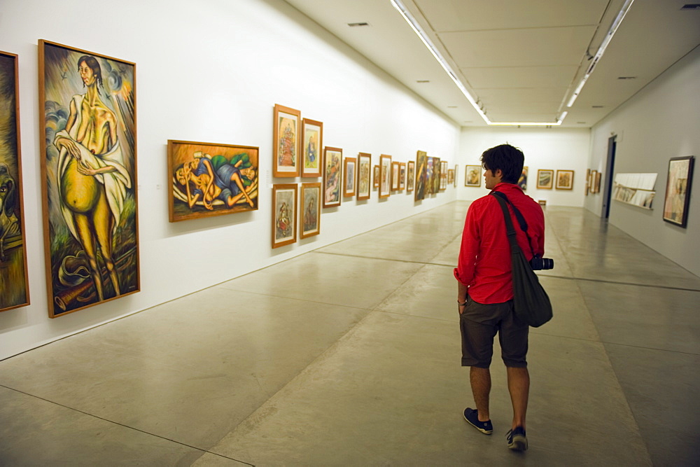 Tourist in Museo de Arte Moderno de MedellÔæín, Modern Art Gallery, Medellin, Colombia, South America