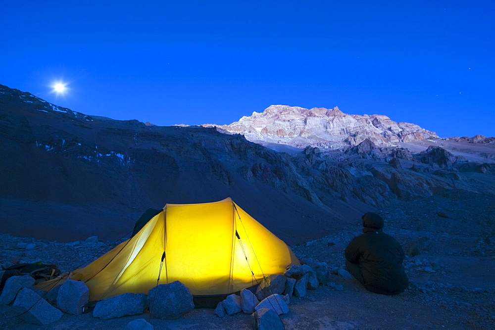 Illuminated tent at Plaza de Mulas base camp, Aconcagua 6962m, highest peak in South America, Aconcagua Provincial Park, Andes mountains, Argentina, South America