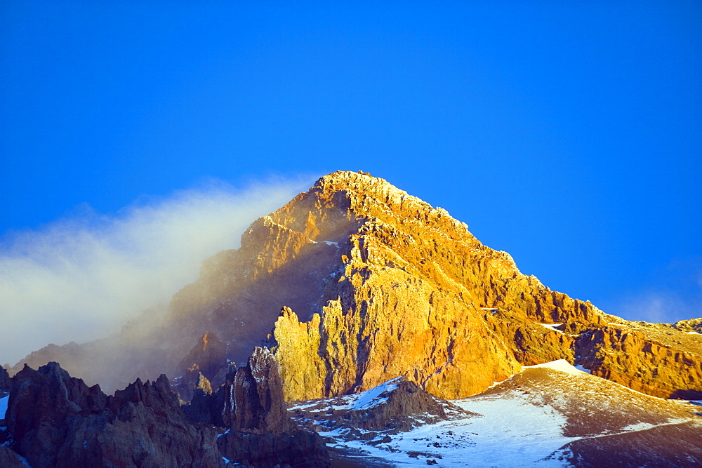 Cloud blowing off the summit of Aconcagua 6962m, highest peak in South America, Aconcagua Provincial Park,Andes mountains, Argentina, South America