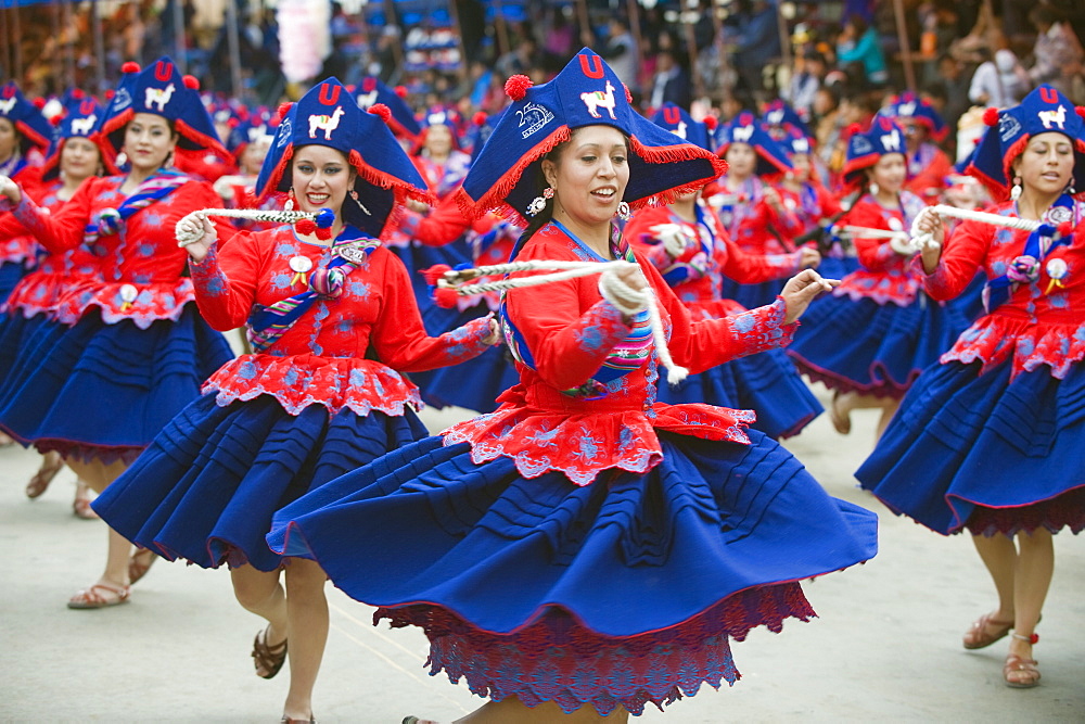 Women dancing in parade at Oruro Carnival, Oruro, Bolivia, South America