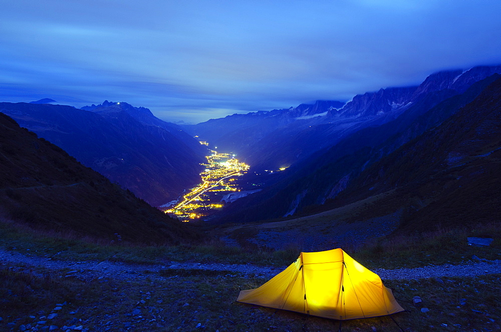 Illuminated tent and Chamonix Valley, Haute-Savoie, French Alps, France, Europe