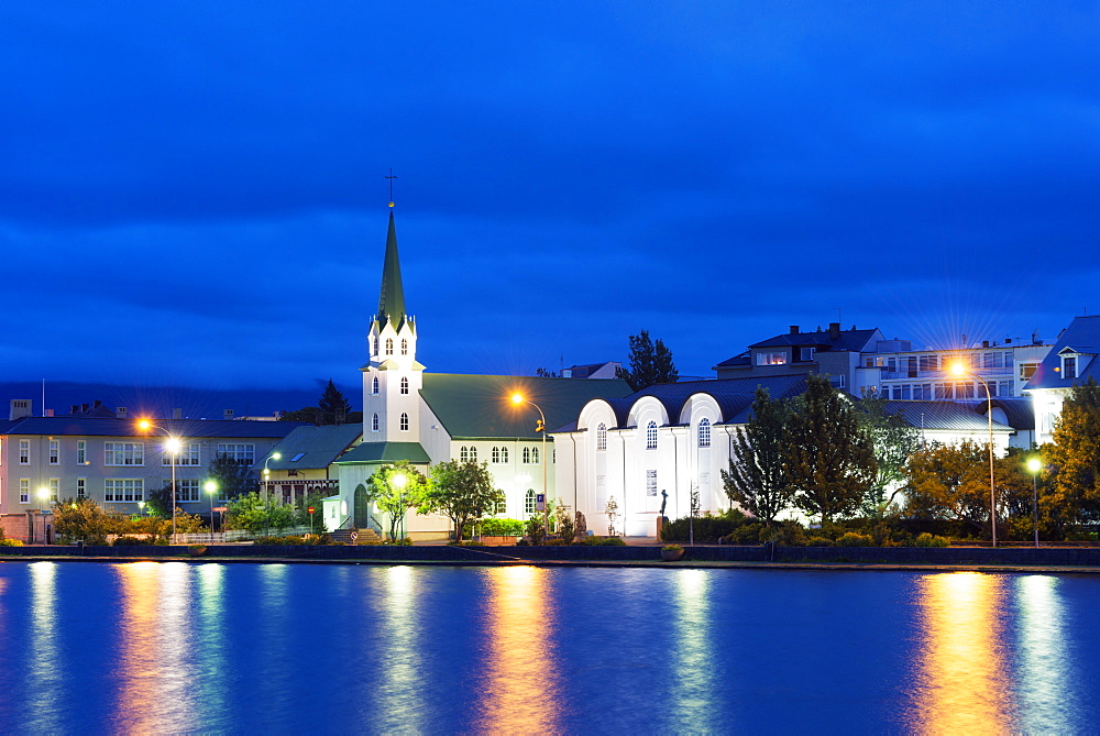 Waterfront church on Lake Tjornin, Reykjavik, Iceland, Polar Regions