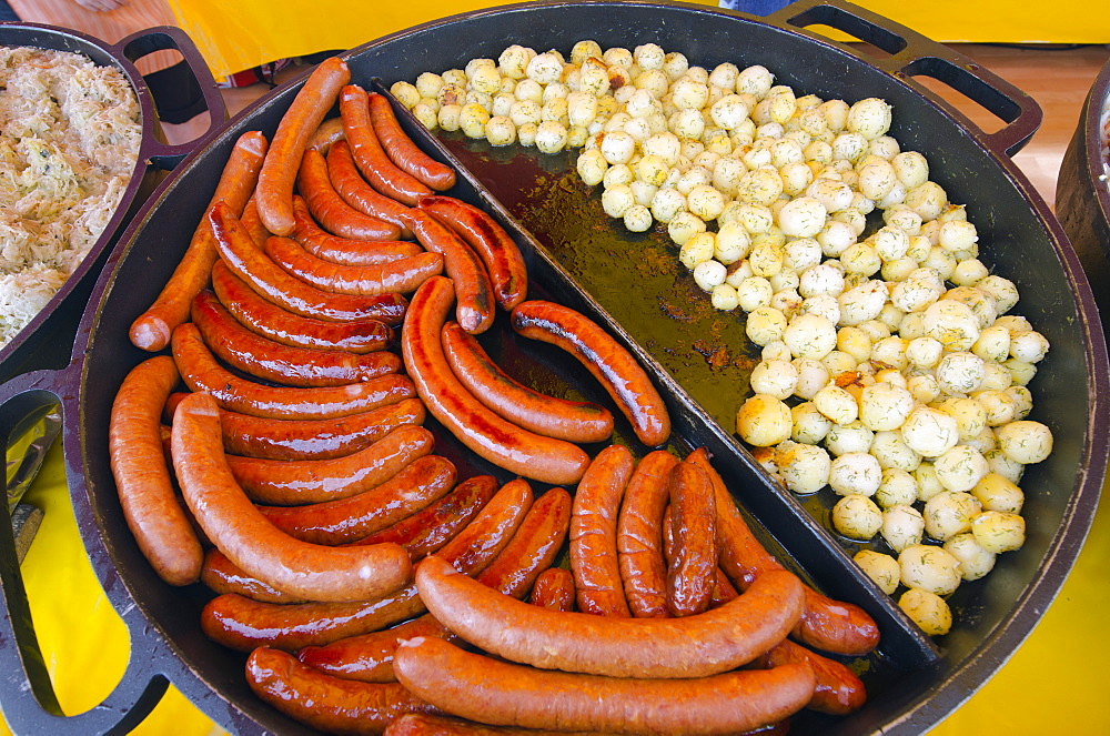 Food stall in market square, historic old town, Poznan, Poland, Europe