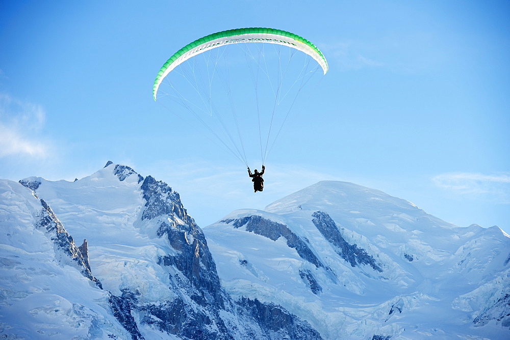 Paragliding below summit of Mont Blanc, Chamonix, Haute-Savoie, French Alps, France, Europe