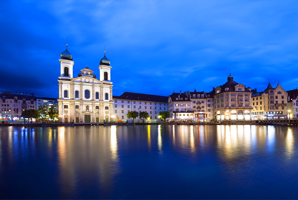 Jesuit church on the waterfront of old town on the Reuss River, Lucerne, Switzerland, Europe