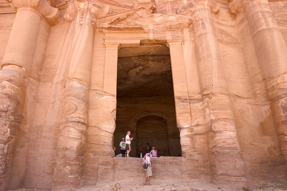 Tourists at the door of the Monastery, Petra, UNESCO World Heritage Site, Wadi Musa (Mousa), Jordan, Middle East