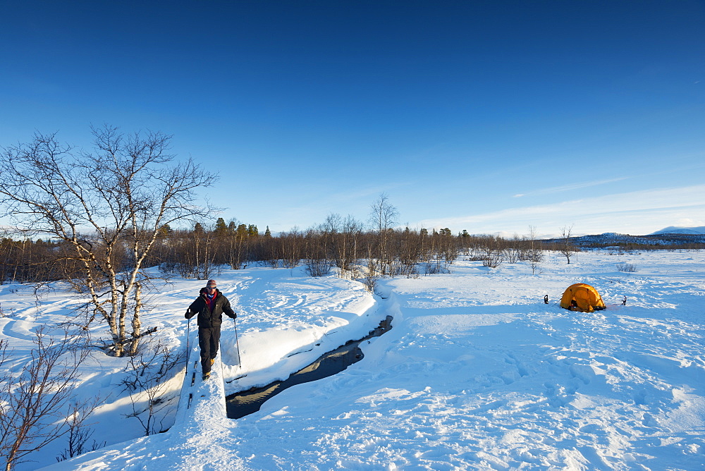 Hiker on Kungsleden (The Kings Trail) hiking trail, Abisko National Park, Sweden, Scandinavia, Europe