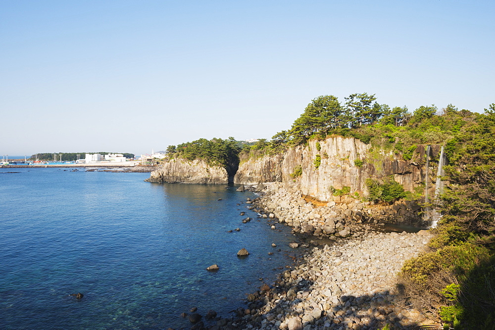 Jeongbang waterfall cascading into the sea, Seogwipo City, Jeju Island, UNESCO World Heritage Site, South Korea, Asia