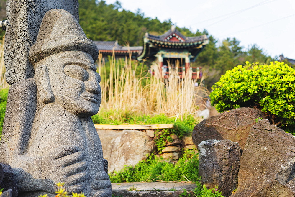 Dol hareubang (harubang) protection and fertility statue at Sanbanggulsa Temple, Jeju Island, South Korea, Asia