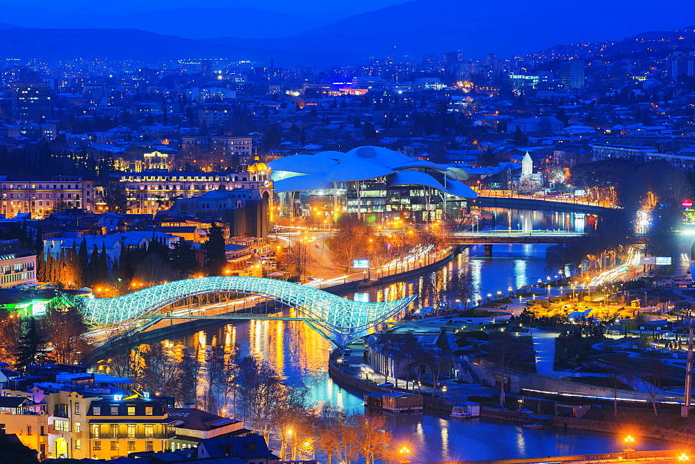 City view, Bridge of Peace and Public Service Hall House of Justice on Mtkvari River, Tbilisi, Georgia, Caucasus, Central Asia, Asia