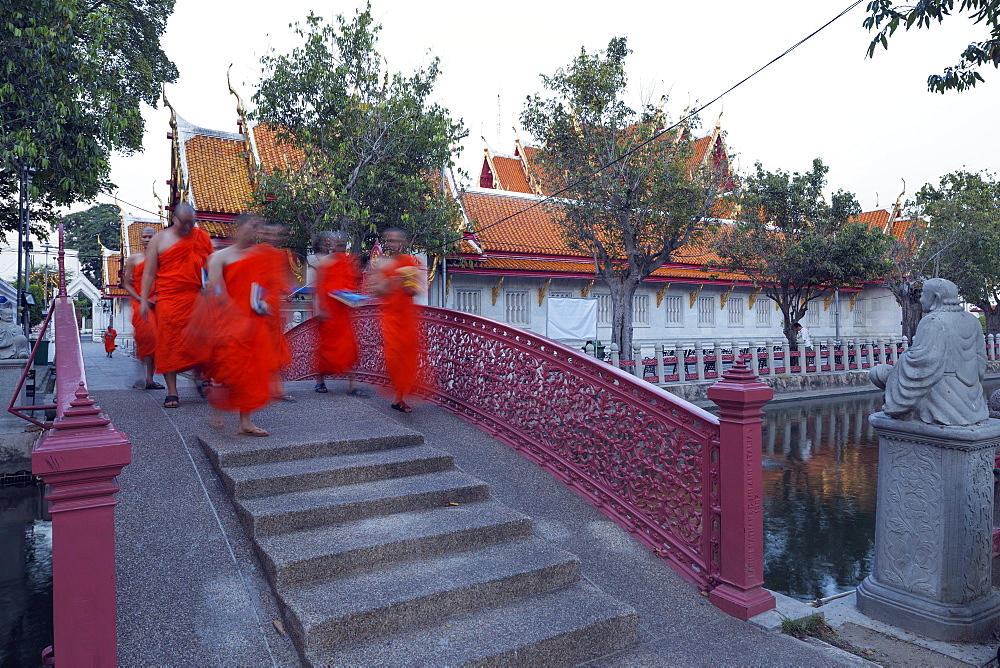 Monks in saffron robes, Wat Benchamabophit (The Marble Temple), Bangkok, Thailand, Southeast Asia, Asia