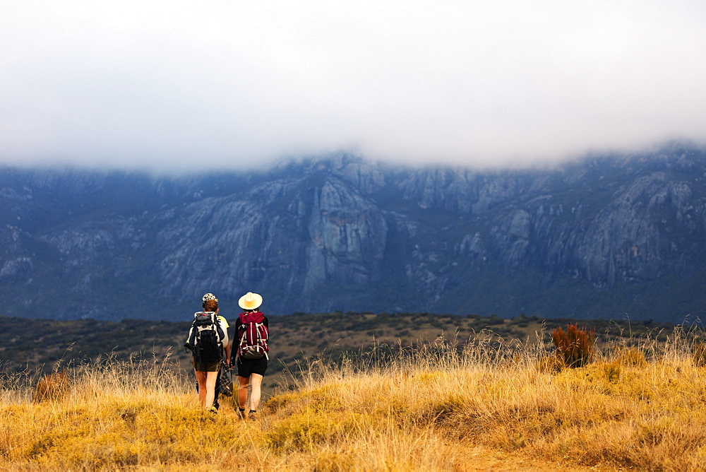 Girls hiking on a trail, Andringitra National Park, Ambalavao, central area, Madagascar, Africa