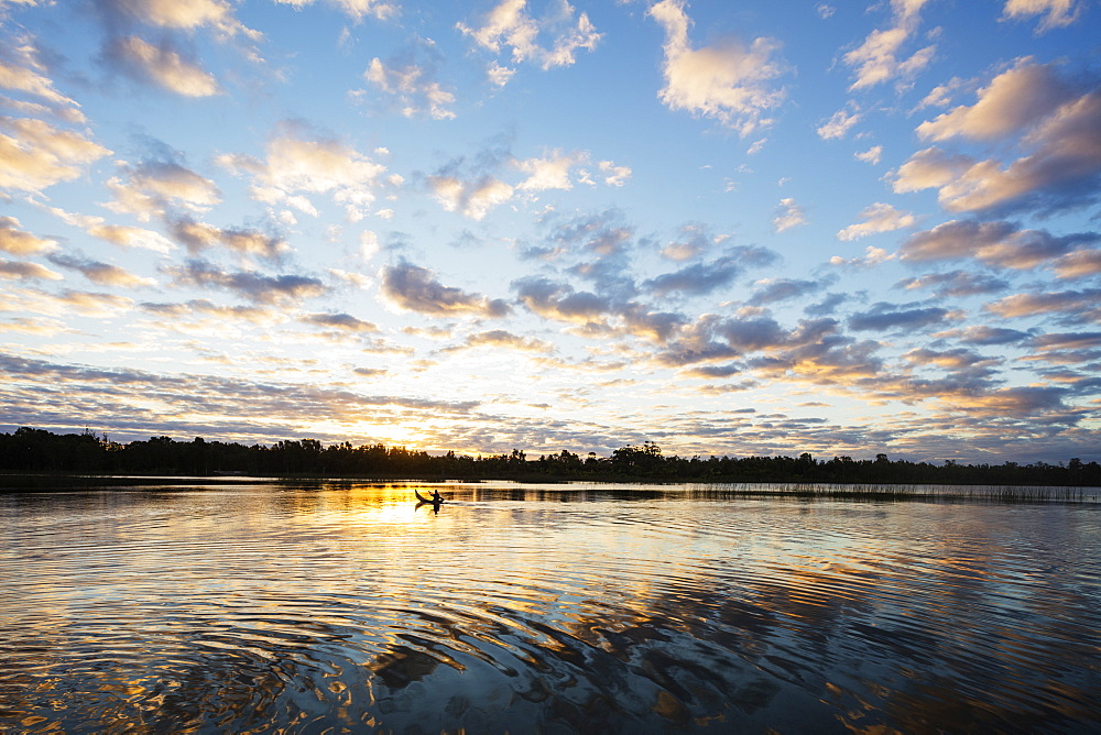 Clouds at sunset, Pangalanes Lakes canal system, Tamatave, Madagascar, Africa