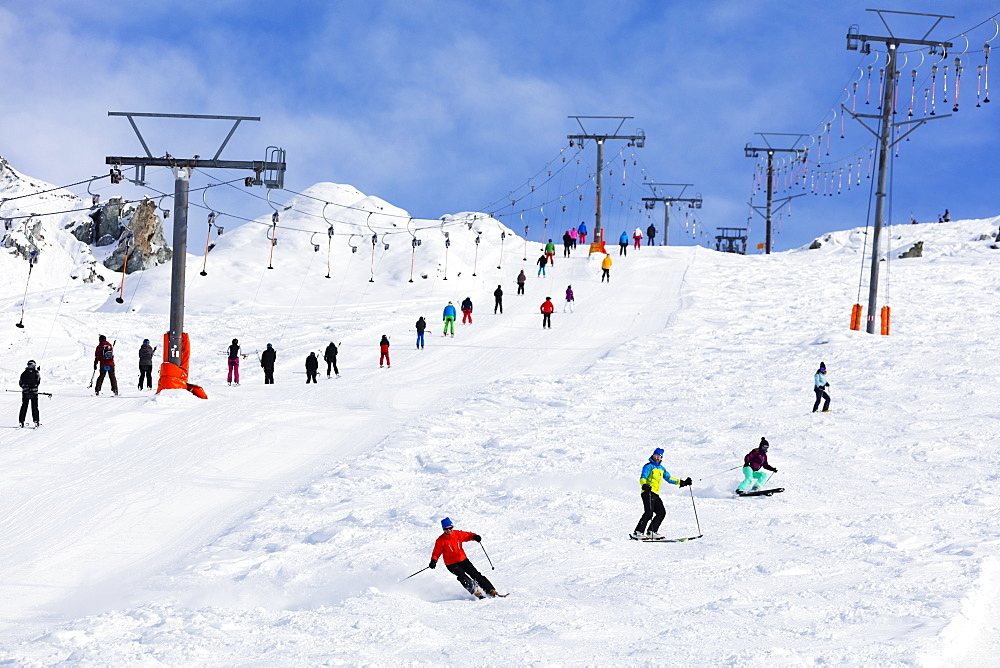 Skiers on a drag lift, Veysonnaz (Verbier), 4 Vallees, Valais, Swiss Alps, Switzerland, Europe