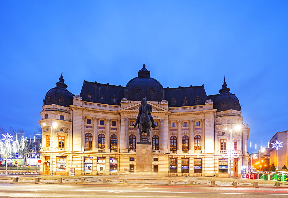 Central University library and statue of King Carol I of Romania, Bucharest, Romania, Europe