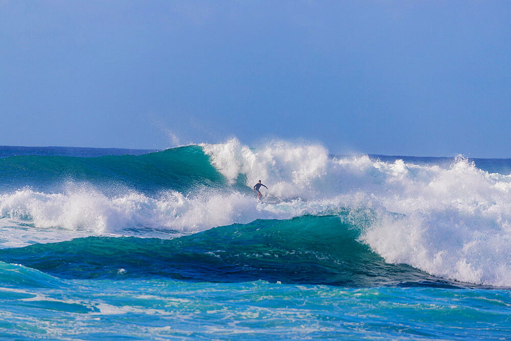 Surfer on the North Shore, Oahu Island, Hawaii, United States of America, North America