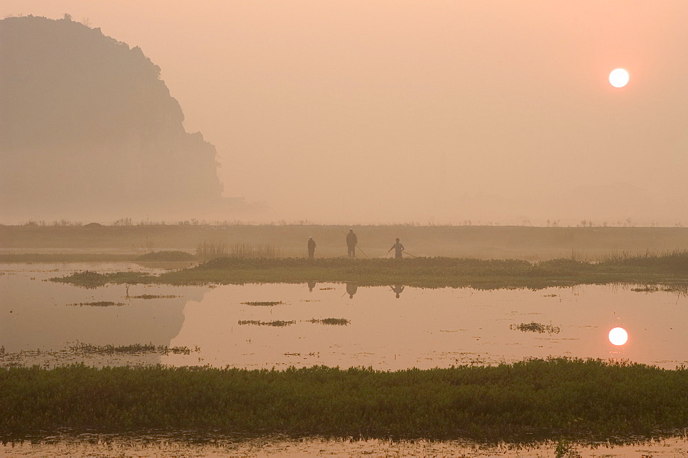 Morning mist, sunrise, limestone mountain scenery, Tam Coc, Ninh Binh, south of Hanoi, North Vietnam, Southeast Asia, Asia