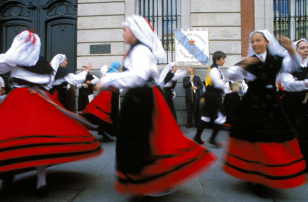 Spaniards in national dress performing outdoors at Plaza de la Puerto del Sol, Centro, Madrid, Spain, Europe