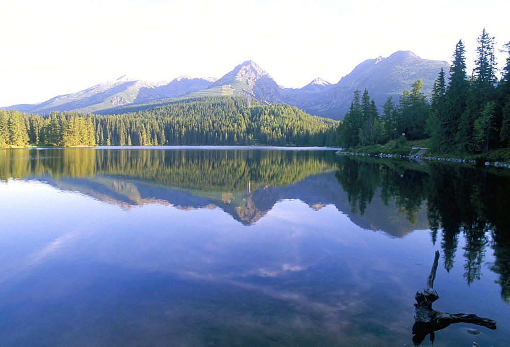 Strbske pleso (lake) and peaks of Vysoke Tatry mountains at sunrise, Vysoke Tatry, Slovakia, Europe