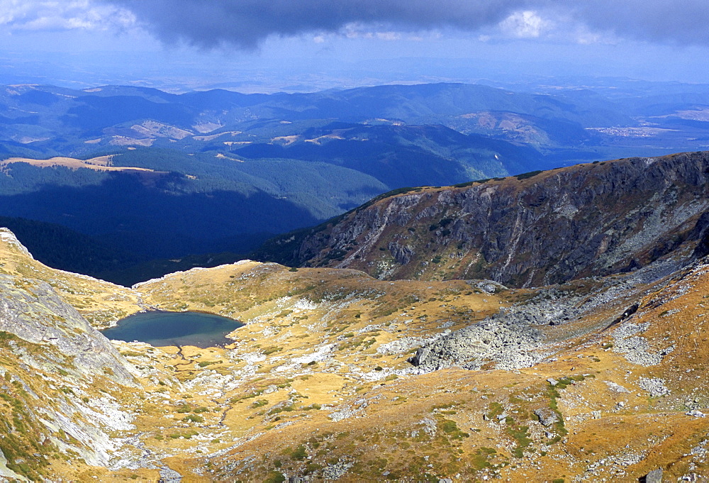 Lake in valley below Hajduta peak, 2465m, in Rila Mountains, Rila National Park, Bulgaria, Europe