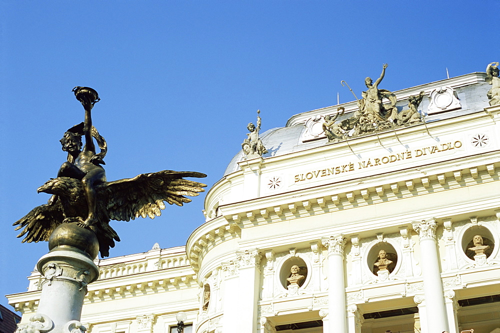 Statue and detail of facade of Bratislava's neo-baroque Slovak National Theatre, now major opera and ballet venue, Bratislava, Slovakia, Europe