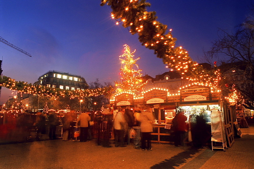 Christmas decoration at market on namesti Miru (square) at twilight, Vinohrady, Prague, Czech Republic, Europe