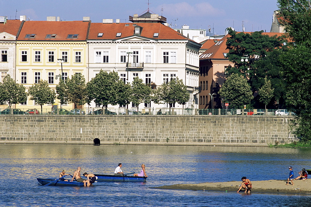 People boating on Vltava River below Smetana embankment, Stare Mesto, Prague, Czech Republic, Europe