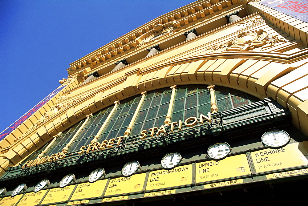 Facade of front of Flinders Street station with clocks showing department of next train, Melbourne, Victoria, Australia, Pacific