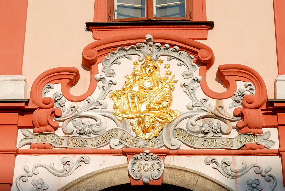 Detail of Baroque decoration on facade of building at Kral Jiri z Podebrad Square in town of Cheb, Karlovarsky Region, West Bohemia, Czech Republic, Europe