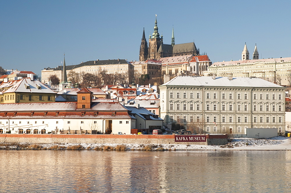 Snow-covered Prague Castle, Mala Strana and Vltava River, UNESCO World Heritage Site, Prague, Czech Republic, Europe