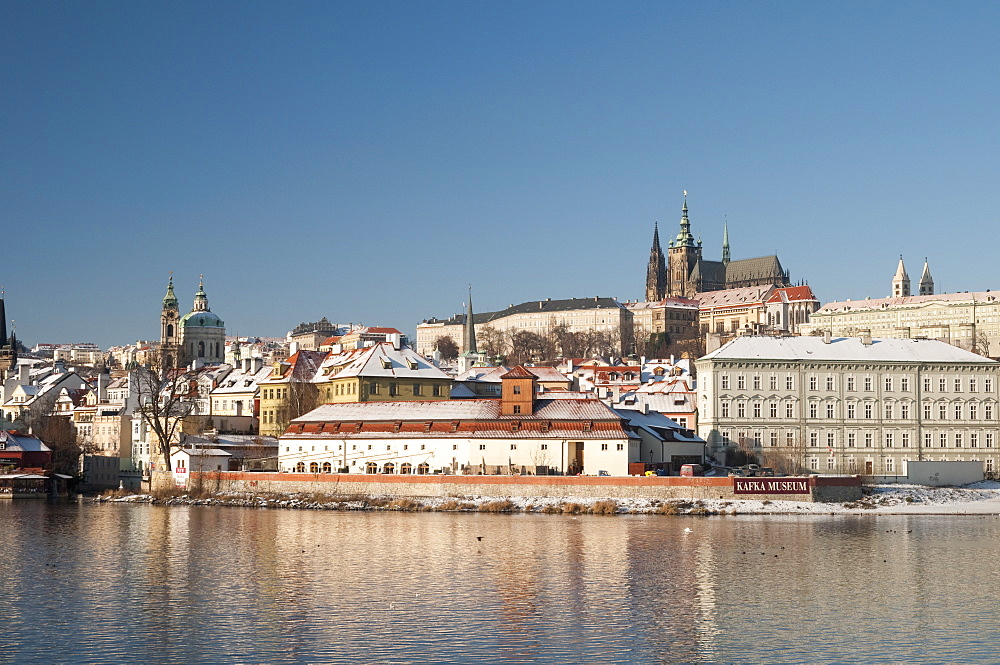 Snow-covered Prague Castle, Mala Strana and Vltava River, UNESCO World Heritage Site, Prague, Czech Republic, Europe