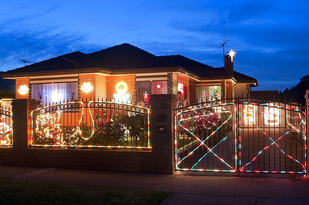 Christmas decoration of Melbourne suburban house at twilight, Altona suburb, Melbourne, Victoria, Australia, Pacific