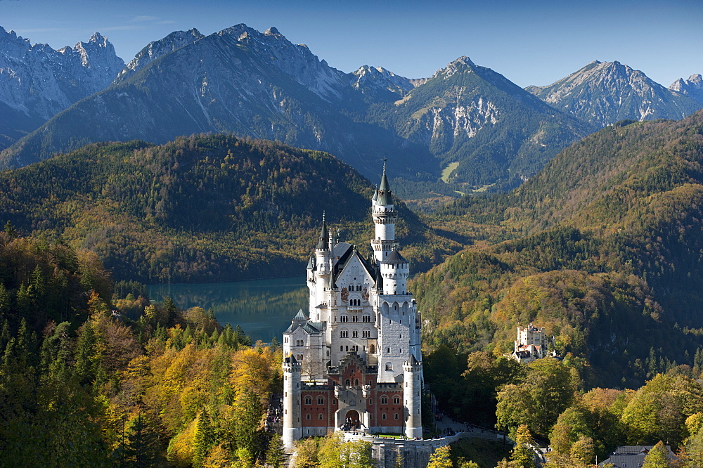 Romantic Neuschwanstein Castle and German Alps in autumn, southern part of Romantic Road, Bavaria, Germany, Europe