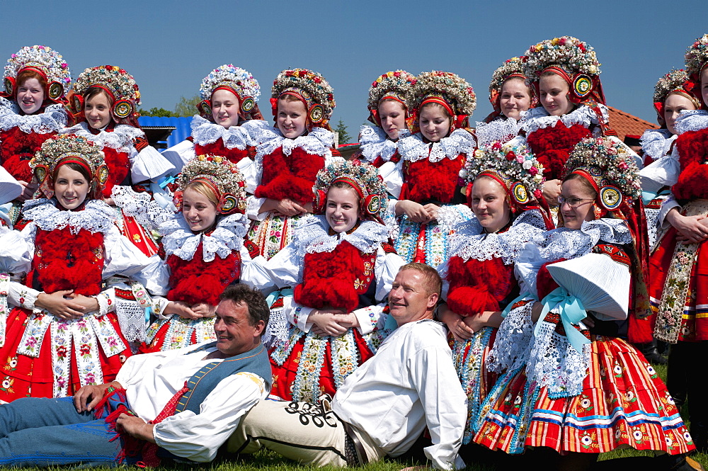 Girls and men wearing folk dress, The Ride of the Kings festival, Vlcnov, Zlinsko, Czech Republic, Europe