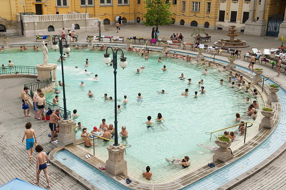 Outdoor pool with men and women at Szechenyi Thermal Baths, Budapest, Hungary, Europe