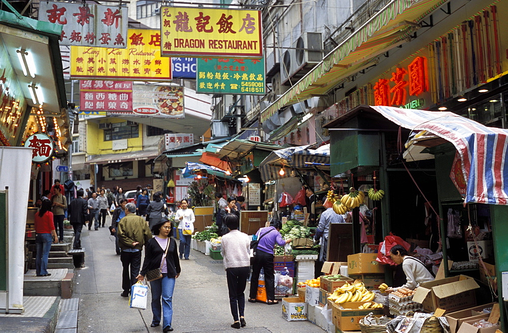 Market area, shops and signs in a street in Soho, Hong Kong, China, Asia