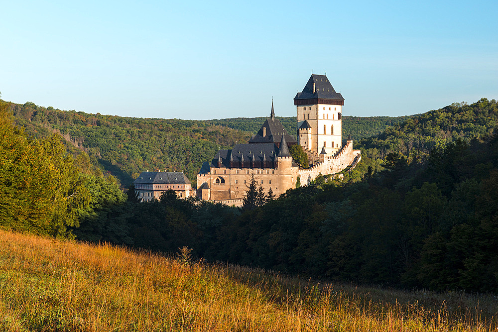 The Gothic 14th century Karlstejn Castle at sunrise, Karlstejn, Central Bohemia, Czechia, Europe