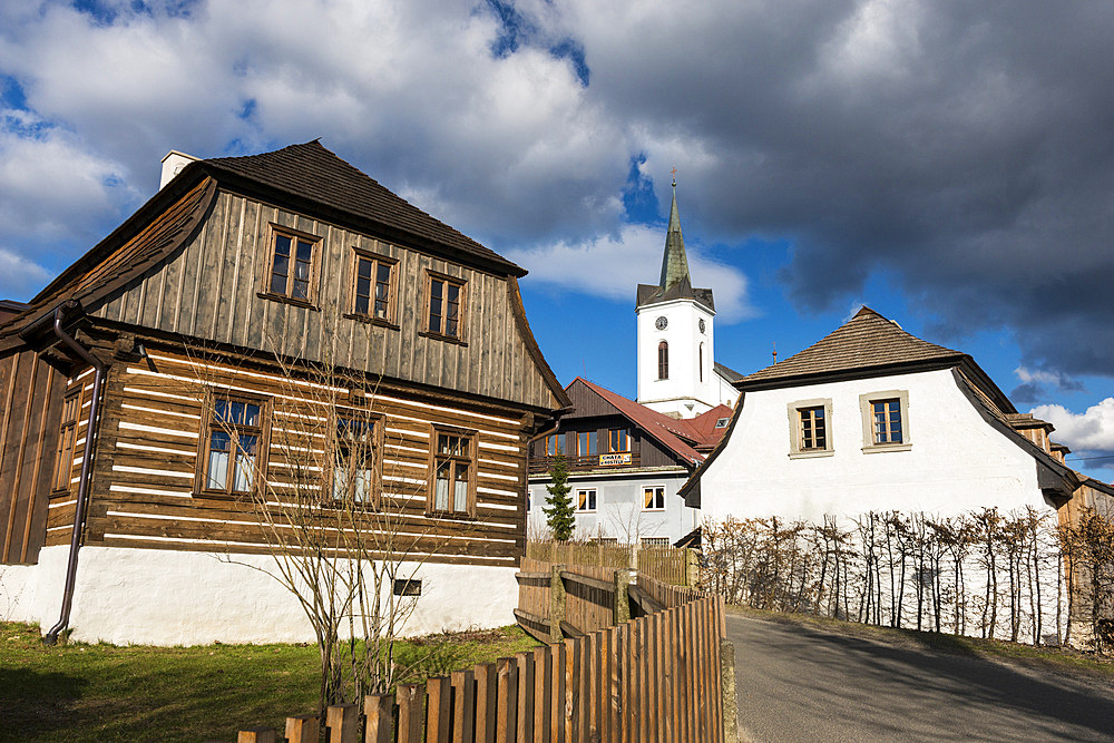 Church of Saint Vitus and traditional wooden houses, Village of Prichovice, Liberecko, Czechia, Europe