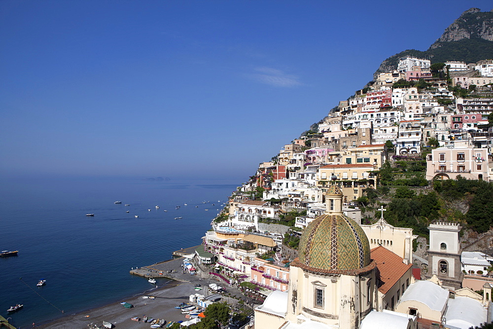 View of Positano with the typical majolica dome of Santa Maria Assunta, Costiera Amalfitana, UNESCO World Heritage Site, Campania, Italy, Europe