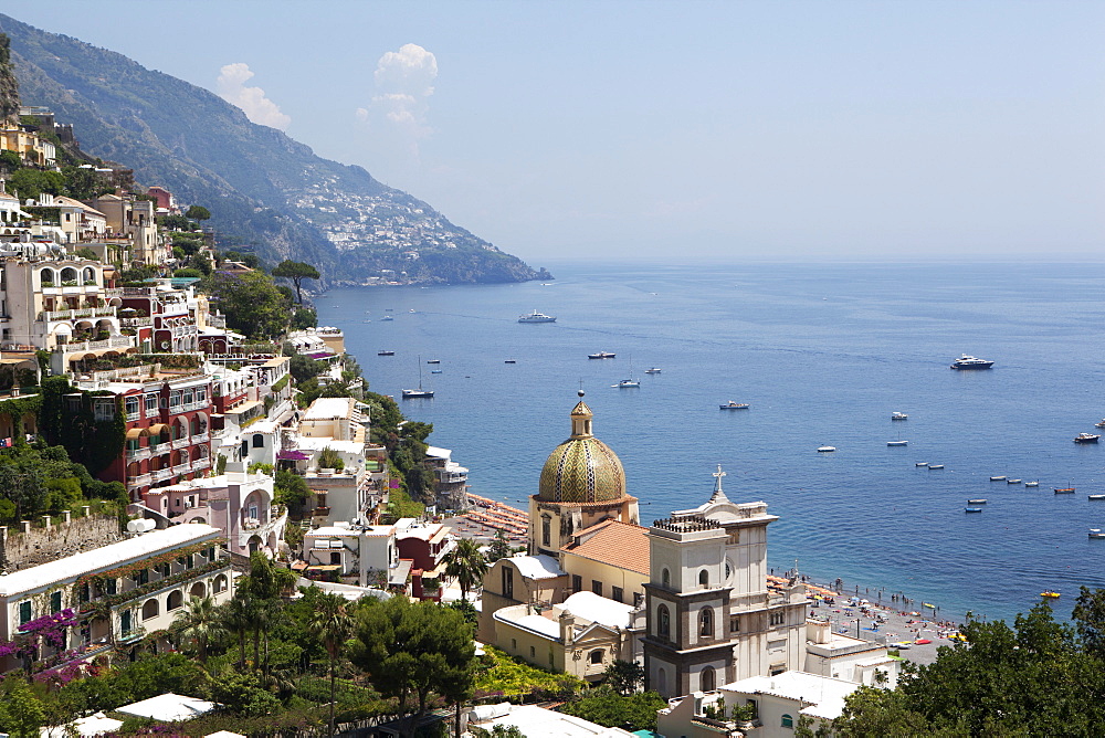 View of Positano with the typical majolica dome of Santa Maria Assunta, Costiera Amalfitana, UNESCO World Heritage Site, Campania, Italy, Europe