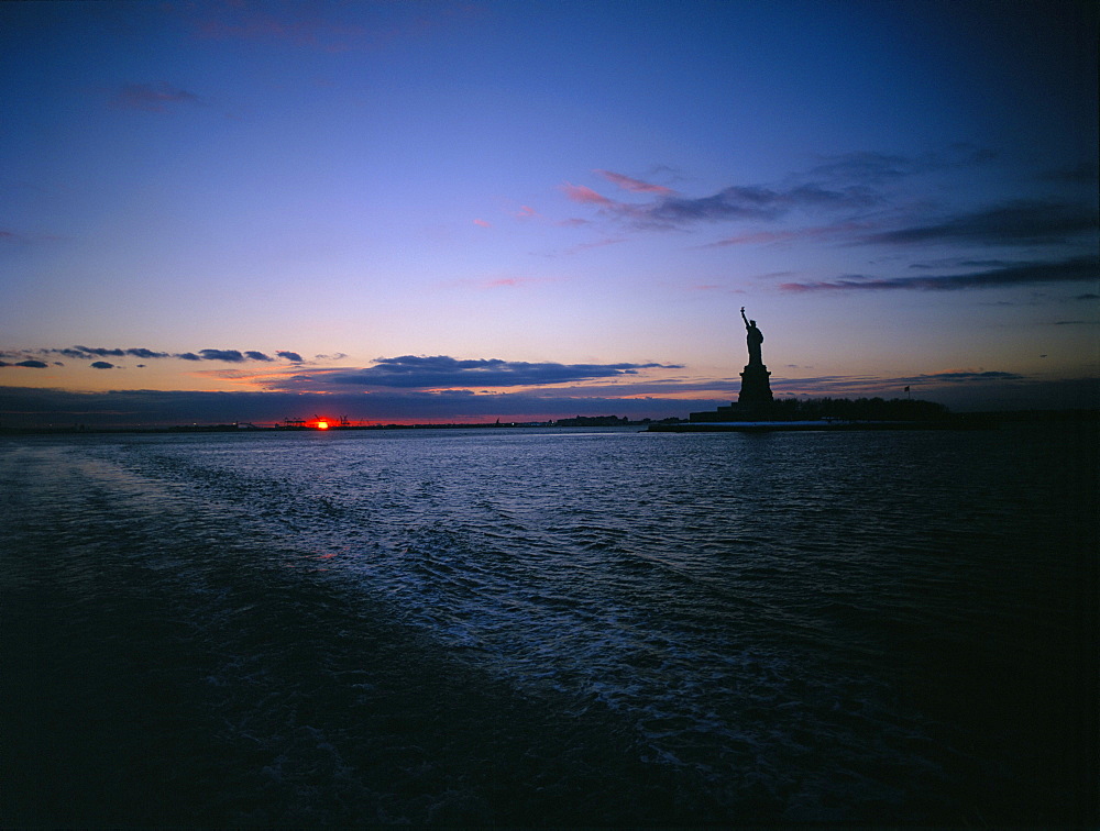 Statue of Liberty at sunset, New York City, New York, United States of America, North America