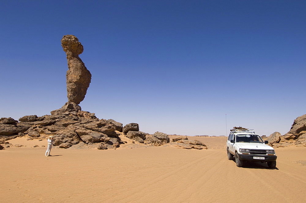 Rock formation called The Finger of Allah, Akakus, Sahara desert, Fezzan, Libya, North Africa, Africa