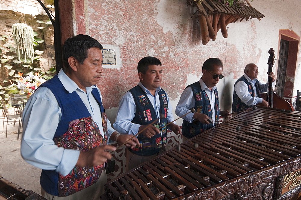 Men playing Marimba at Hotel Posada Don Rodrigo, Antigua, Guatemala, Central America