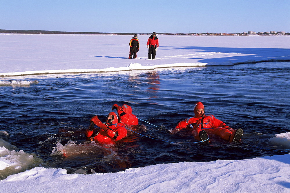 Swimmers from the Icebreaker Arctic Explorer, Gulf of Bothnia, Lapland, Sweden, Scandinavia, Europe