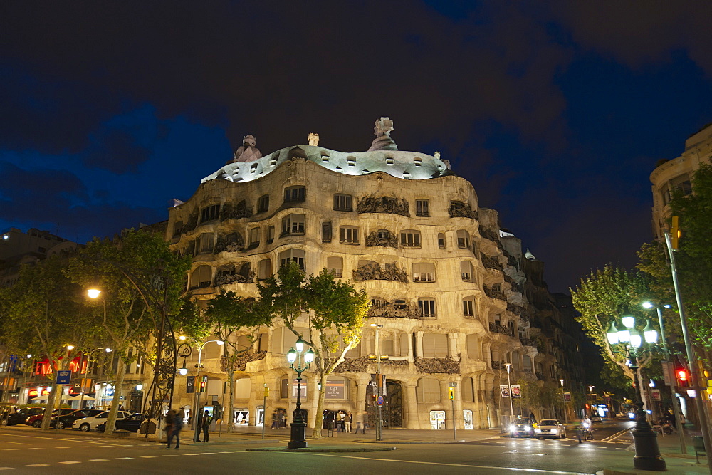 Casa Mila (La Pedrera), by Antoni Gaudi at dusk, Passeig de Gracia, Barcelona, Catalonia, Spain, Europe