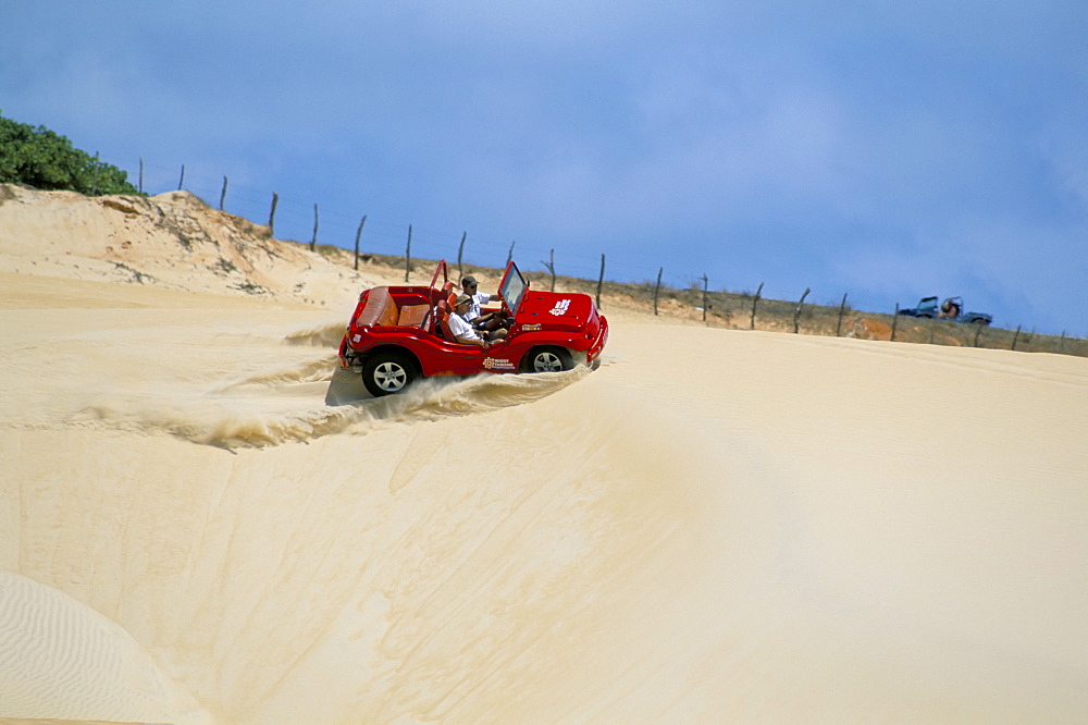 Dune buggy on sand dunes, Pitangui, Natal, Rio Grande do Norte state, Brazil, South America