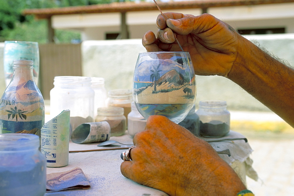 Preparing sand bottles, Pipa, Natal, Rio Grande do Norte state, Brazil, South America