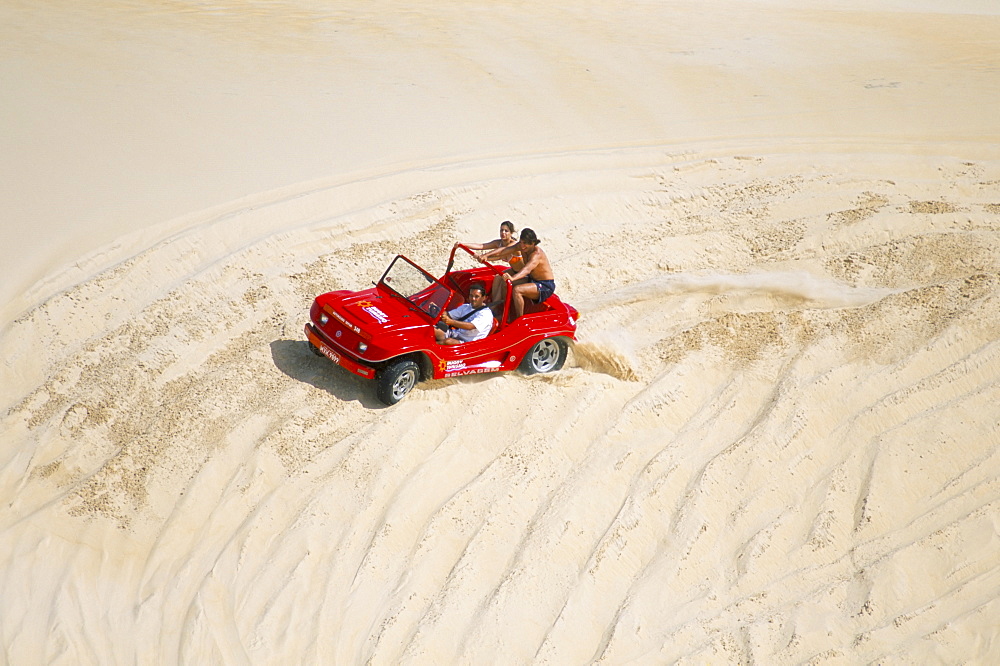 Dune buggy on sand dunes, Genipabu (Natal), Rio Grande do Norte state, Brazil, South America